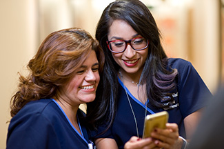 UCLA Helath Two Girls seeing Mobile